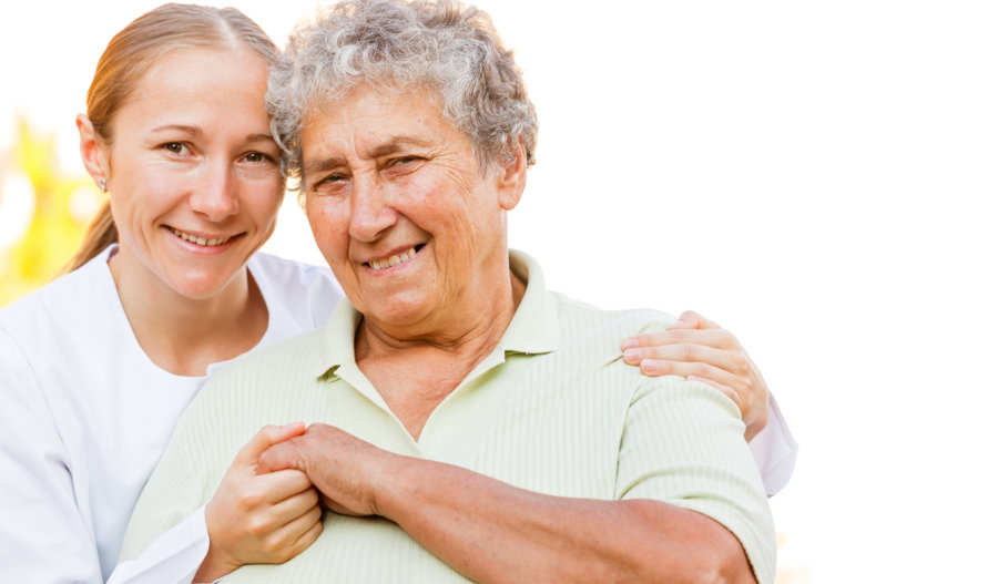 closeup photo of an old woman with her caregiver