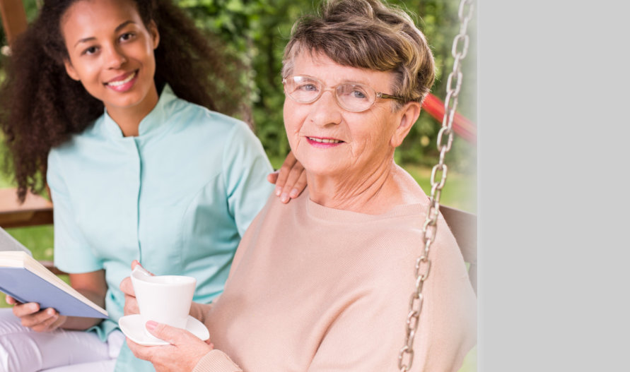 portrait of an old woman enjoying a cup of coffee with her caregiver